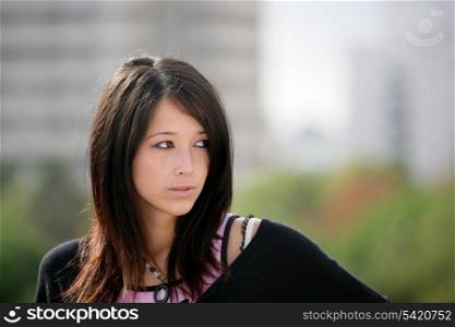 Portrait of Eurasian girl outdoors