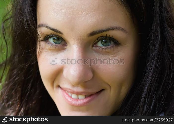 Portrait of European beautiful woman with black hair