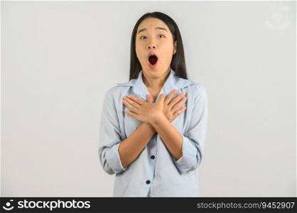 Portrait of Excited young asian woman in blue shirt isolated on white background. Expression and lifestyle concept.