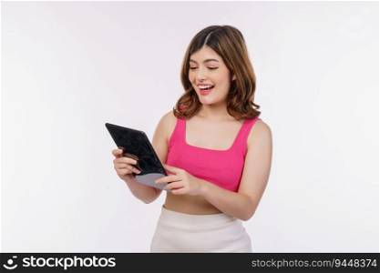 Portrait of excited young woman holding tablet isolated over white background. Technology, people and lifestyle concept.