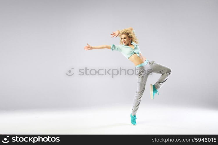 Portrait of exercising and smiling lady