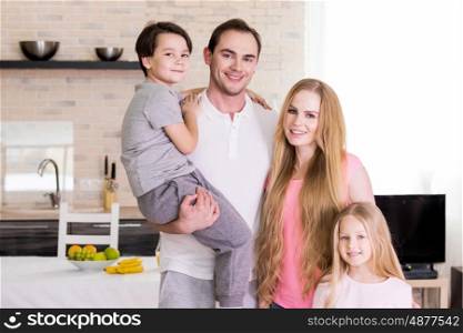 Portrait of family at home. Portrait of happy family with two children at home