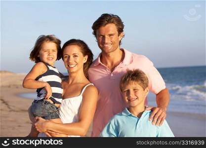Portrait Of Family On Beach Holiday