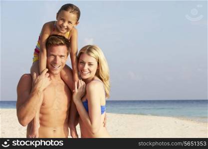 Portrait Of Family On Tropical Beach Holiday