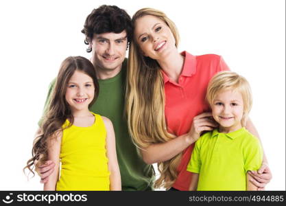 Portrait of family with children. Studio portrait of family in colorful clothes with two children isolated on white background
