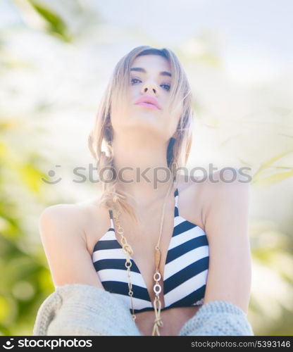 portrait of fashion model posing in bikini