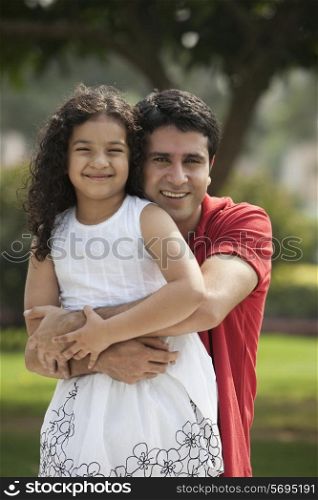 Portrait of father and daughter