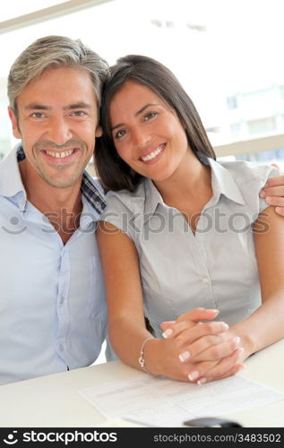 Portrait of father and girl in real-estate agency