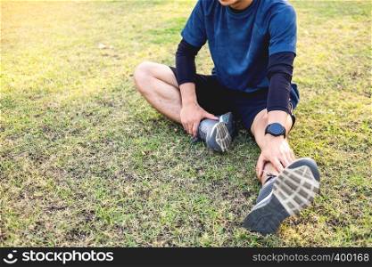 Portrait of fatigued young fit athletic man Muscular for health and strong guy exercising in sportswear outdoors.