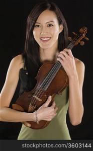 Portrait of female Asian violinist