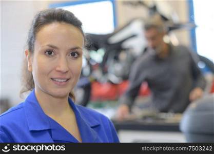 portrait of female auto repair worker