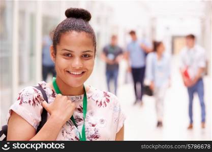 Portrait Of Female College Student In Hallway