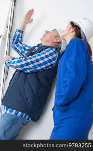 portrait of female electrician apprentice