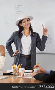 Portrait of female executive umpiring