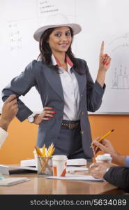 Portrait of female executive umpiring