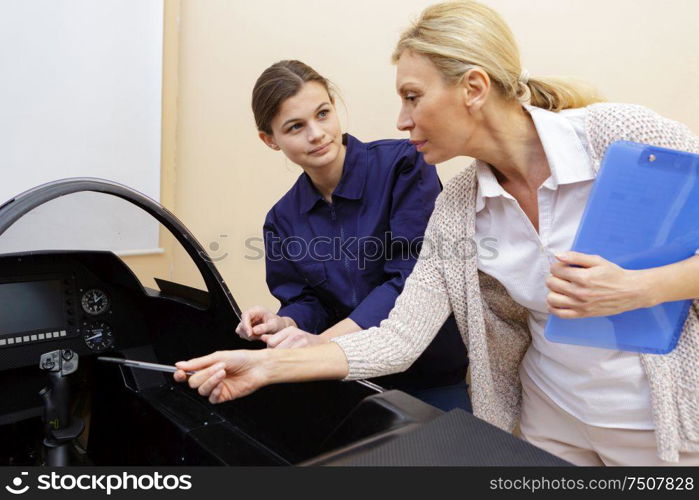 portrait of female glider mechanic