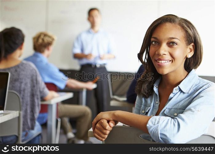 Portrait Of Female High School Student In Classroom