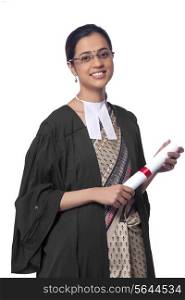 Portrait of female lawyer holding degree isolated over white background