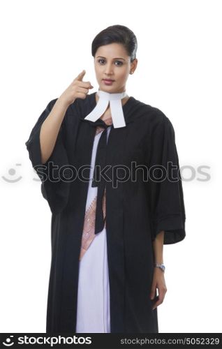 Portrait of female lawyer pointing