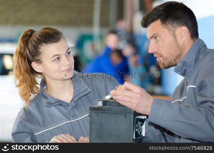 portrait of female mechanic apprentice