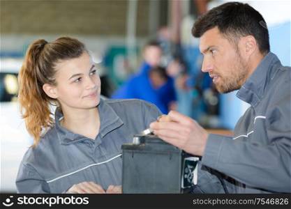portrait of female mechanic apprentice