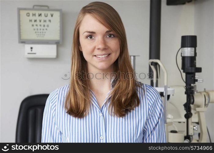 Portrait Of Female Optician In Optometrists