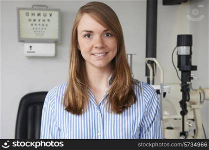 Portrait Of Female Optician In Optometrists