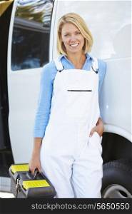 Portrait Of Female Repair Person With Van