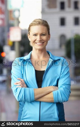 Portrait Of Female Runner On Urban Street