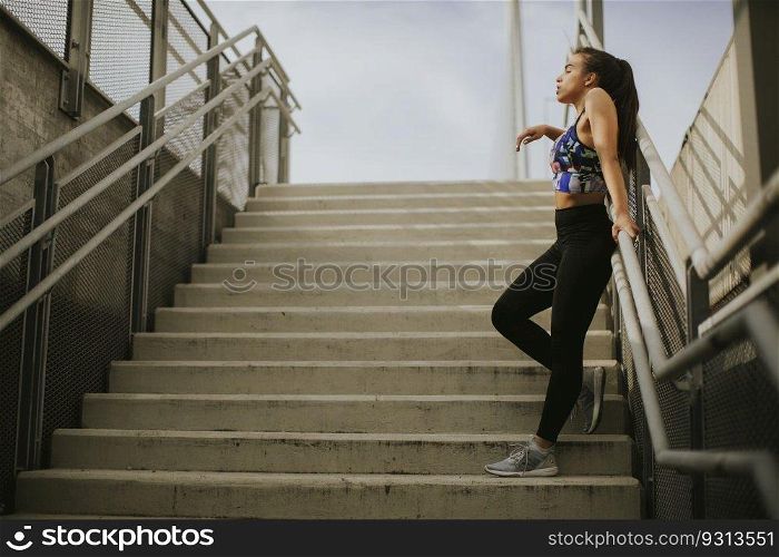 Portrait of female runner resting