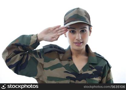Portrait of female soldier saluting