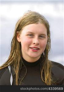 Portrait of female surfer with wet hair