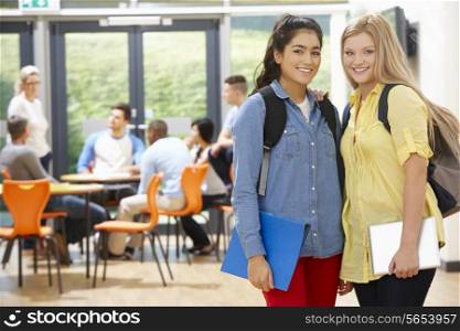 Portrait Of Female Teenage Students In Classroom