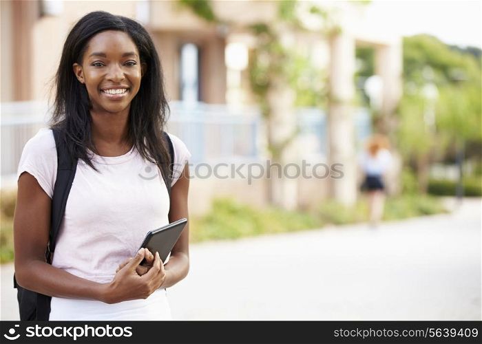 Portrait Of Female University Student Outdoors On Campus