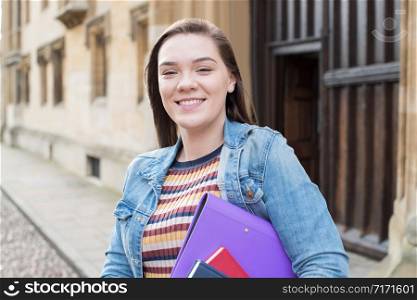 Portrait Of Female University Student Standing Outside Building