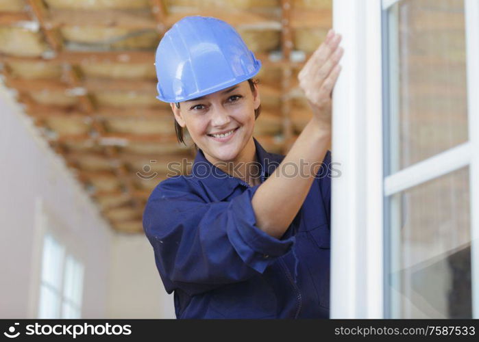 portrait of female window fitter