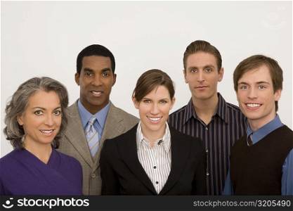 Portrait of five business executives smiling