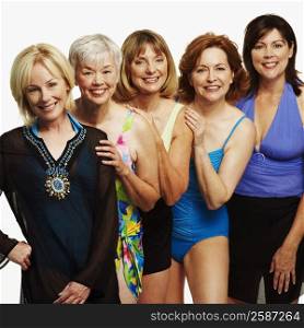 Portrait of five mature women standing together and smiling