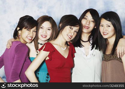 Portrait of five young women smiling