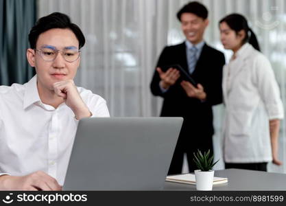 Portrait of focus young successful confident male manager, executive wearing business wear in harmony office arm crossed with blurred meeting background of colleagues, office worker.. Portrait of focus successful confident male manager in harmony office.