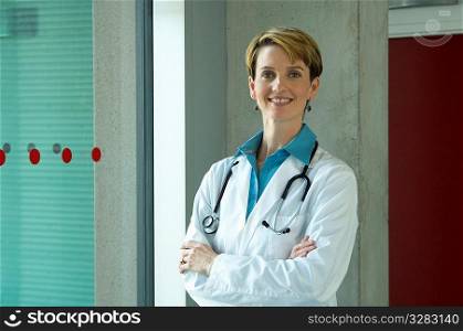 Portrait of friendly female family doctor.