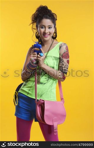 Portrait of funky woman with mobile phone