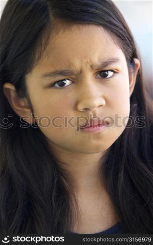 Portrait Of Girl Frowning