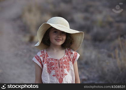 Portrait of girl in sunhat, Almeria, Andalusia, Spain