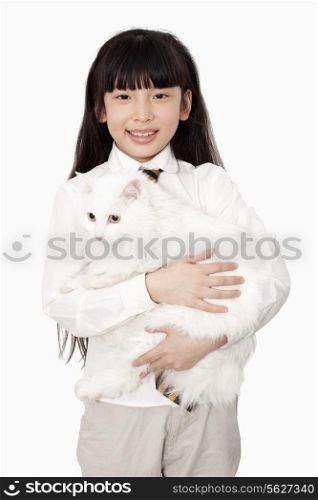 Portrait of girl in white holding a white cat