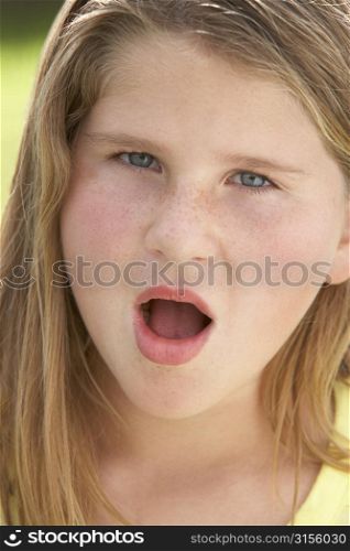Portrait Of Girl Looking Shocked
