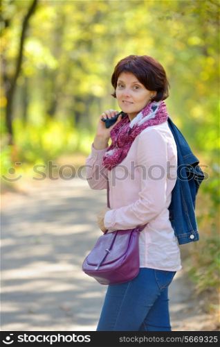 Portrait of girl ready to go on a path in the park