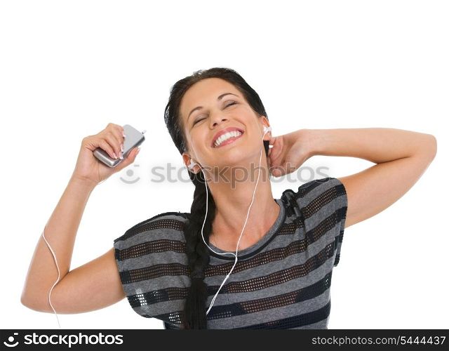 Portrait of girl relaxing by listening music in headphones