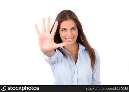 Portrait of girl showing hand to camera
