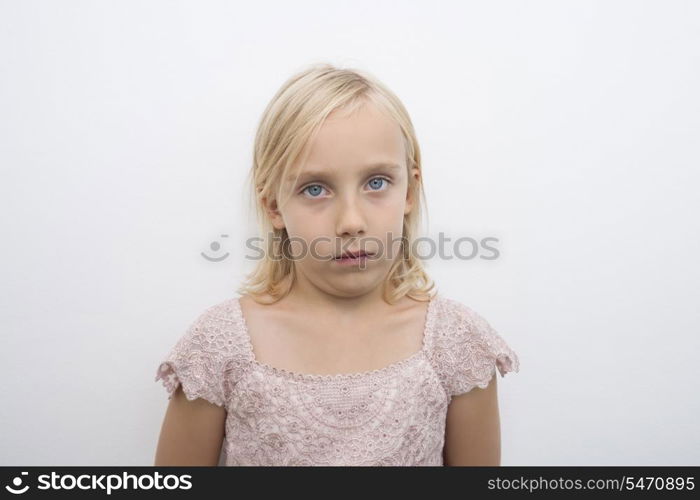 Portrait of girl staring over white background